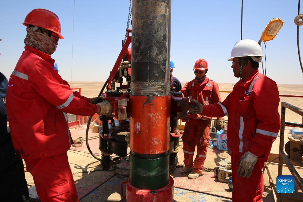 Workers of the Chinese firm Zhongman Petroleum and Gas Group (ZPEC) drill a well for a beet plantation in a desert of Minya Province, Egypt on Aug. 24, 2016. (ZPEC/Handout via Xinhua)