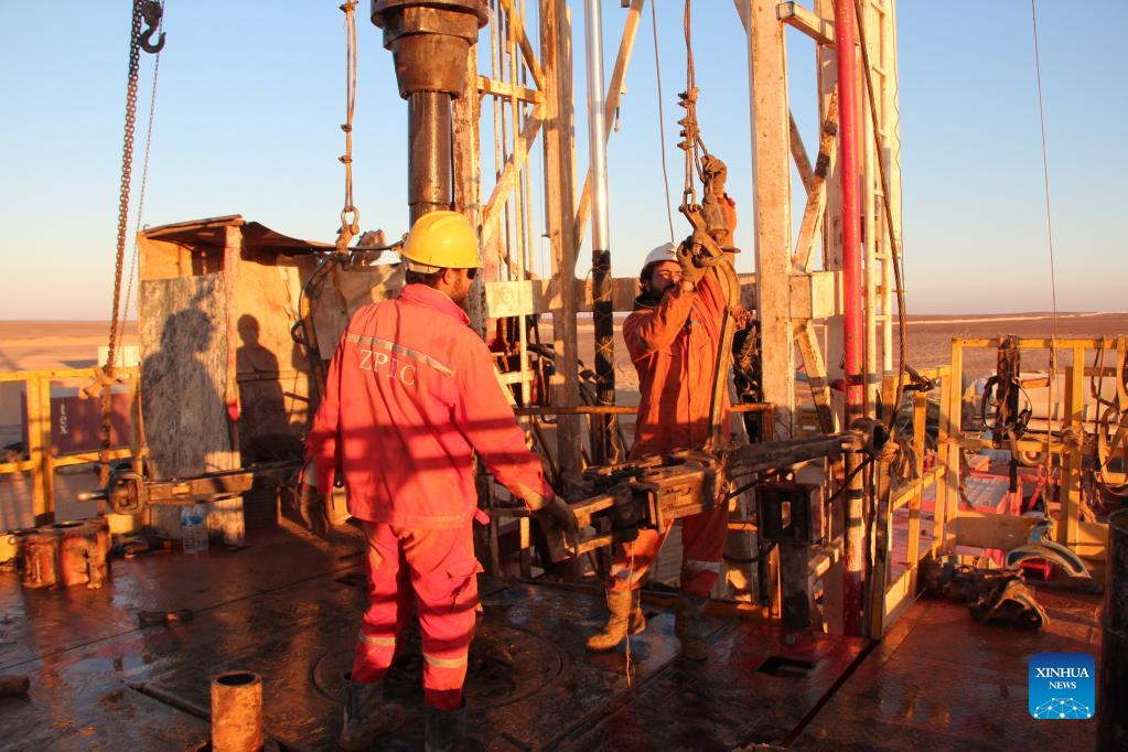 Workers of the Chinese firm Zhongman Petroleum and Gas Group (ZPEC) drill a well for a beet plantation in a desert of Minya Province, Egypt on Nov. 12, 2018. (ZPEC/Handout via Xinhua)